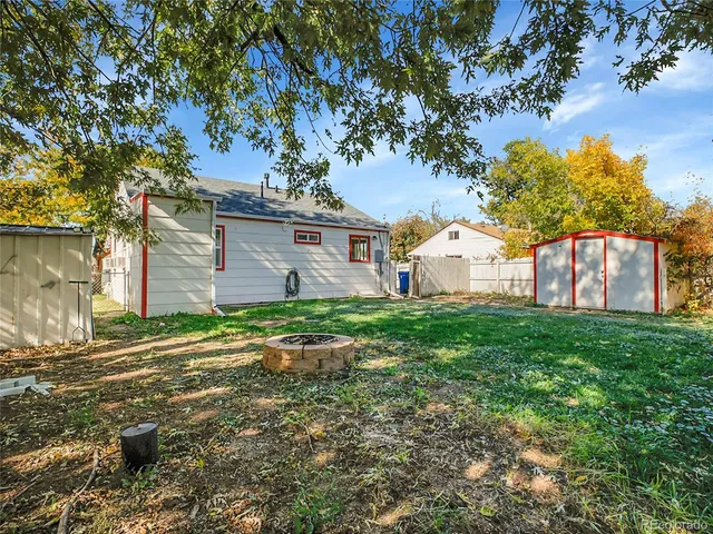 a view of a backyard with a garden