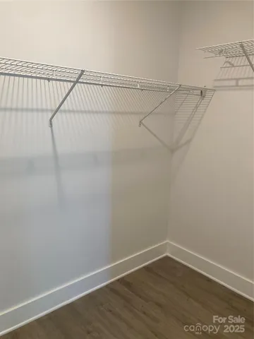 a view of a room with racks on the wall