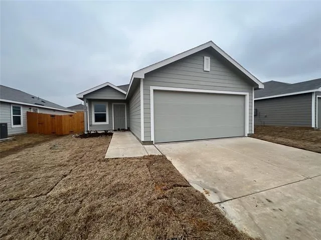 a front view of house with garage