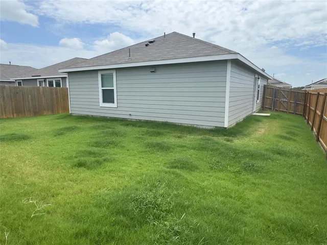 a bathroom with a toilet and a bathtub