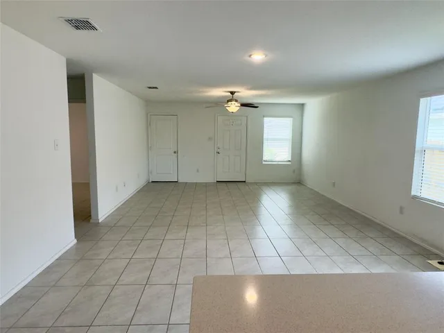 a view of an empty room and window