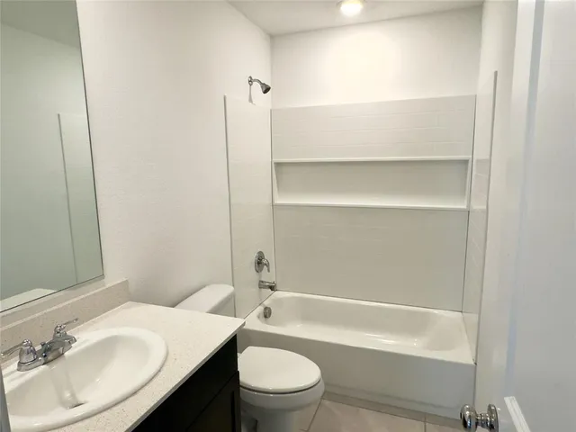 a view of a backyard with a garden