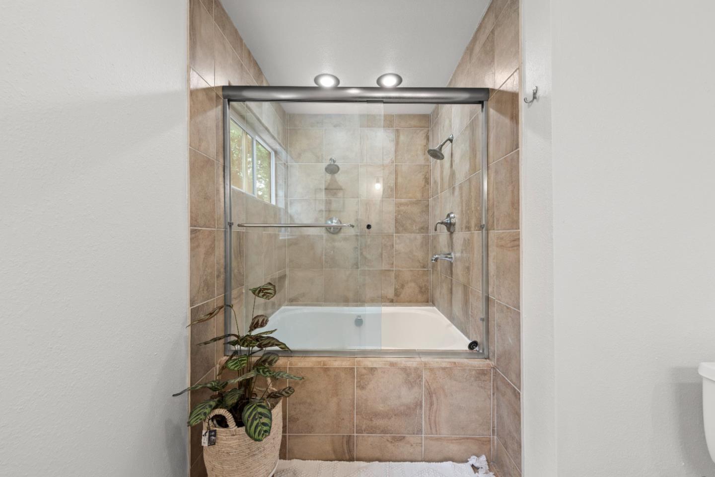 210 Madrona Way Ben Lomond, CA 95005 - Photo 37 of 56 a bathroom with a tub shower vanity and a sink
