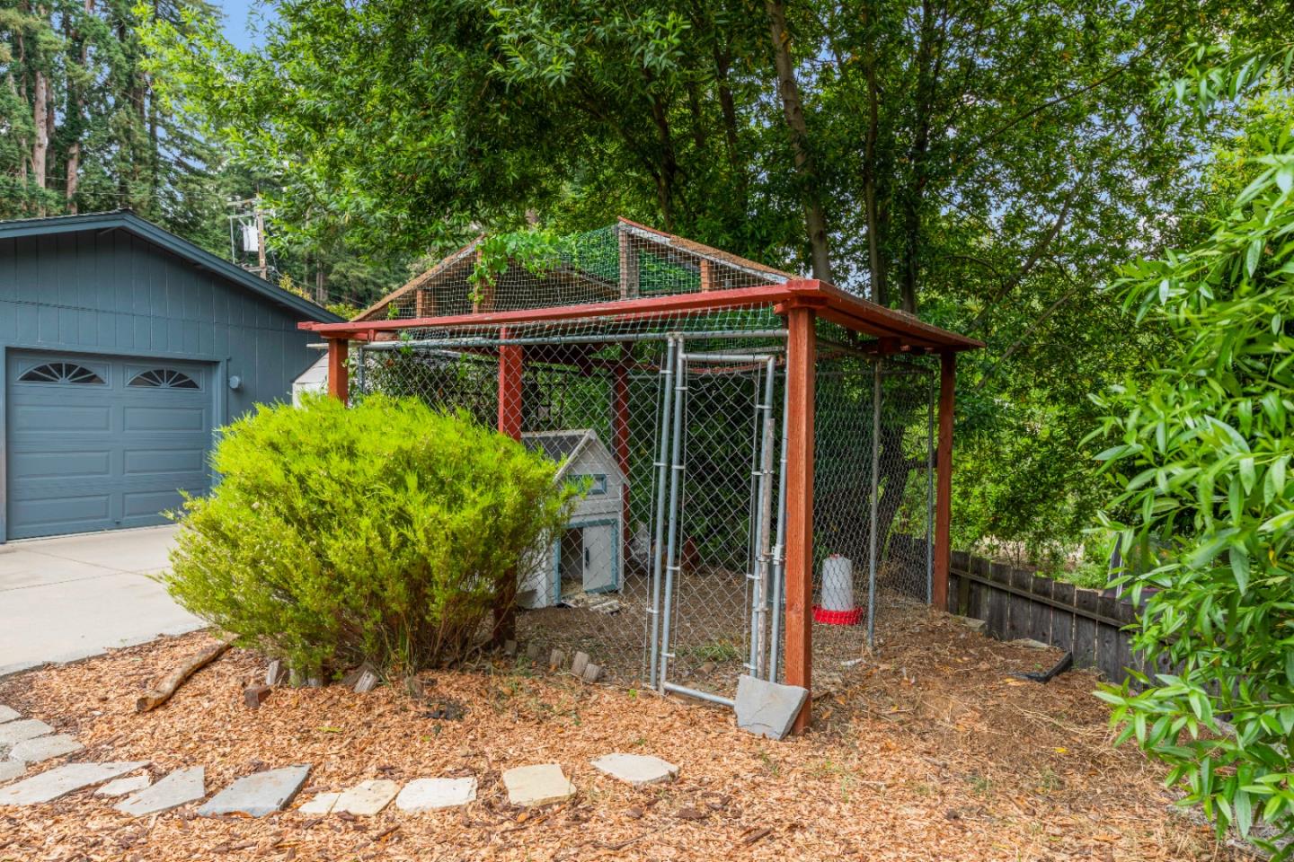 210 Madrona Way Ben Lomond, CA 95005 - Photo 46 of 56 a view of a house with backyard and garden
