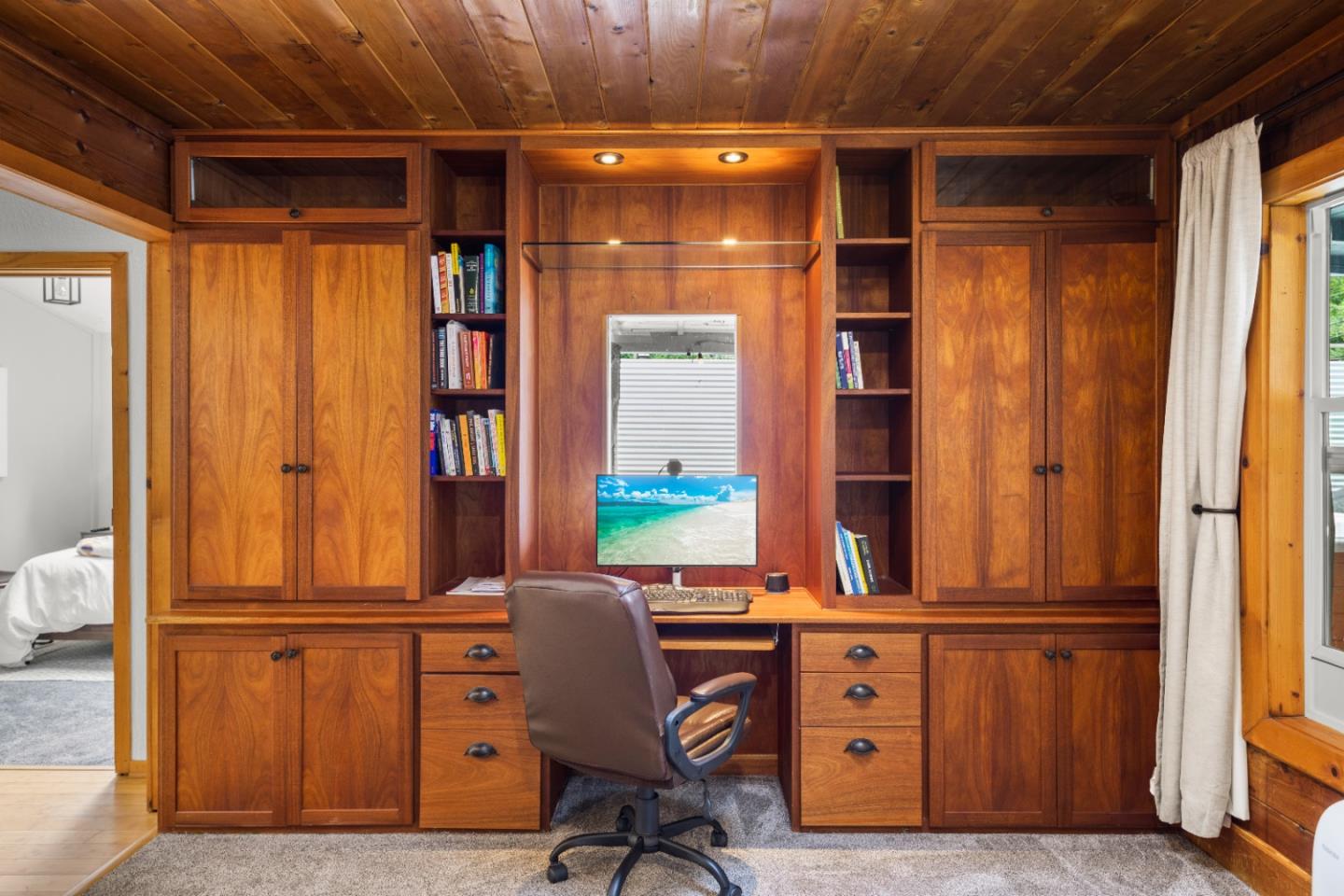 210 Madrona Way Ben Lomond, CA 95005 - Photo 8 of 56 a view of a room with furniture and a window