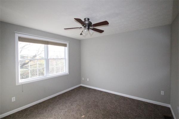 123 Clark Road Shirley, MA 01464 - Photo 18 of 24 an empty room with a window and a fan