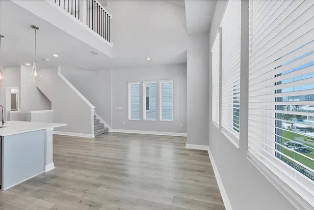 a bathroom with a toilet a sink and a mirror