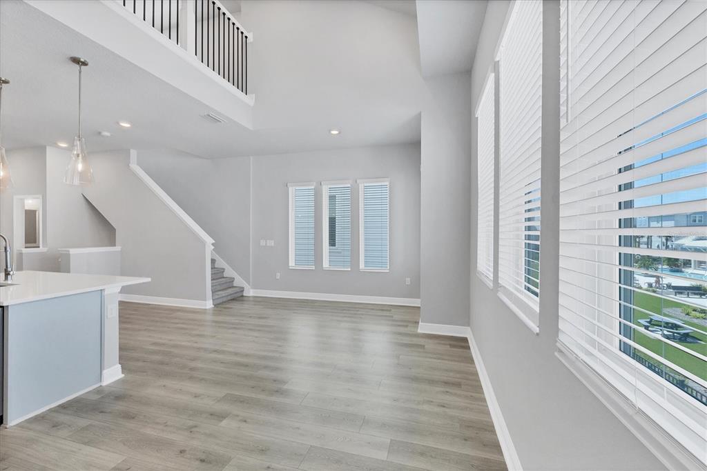 2340 Lindstrom Street Sarasota, FL 34237 - Photo 15 of 59 a view of an entryway with wooden floor