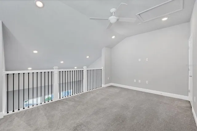 a view of a house with pool and a chairs