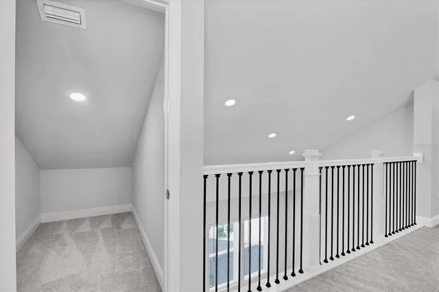 a view of a big room with a big yard and potted plants