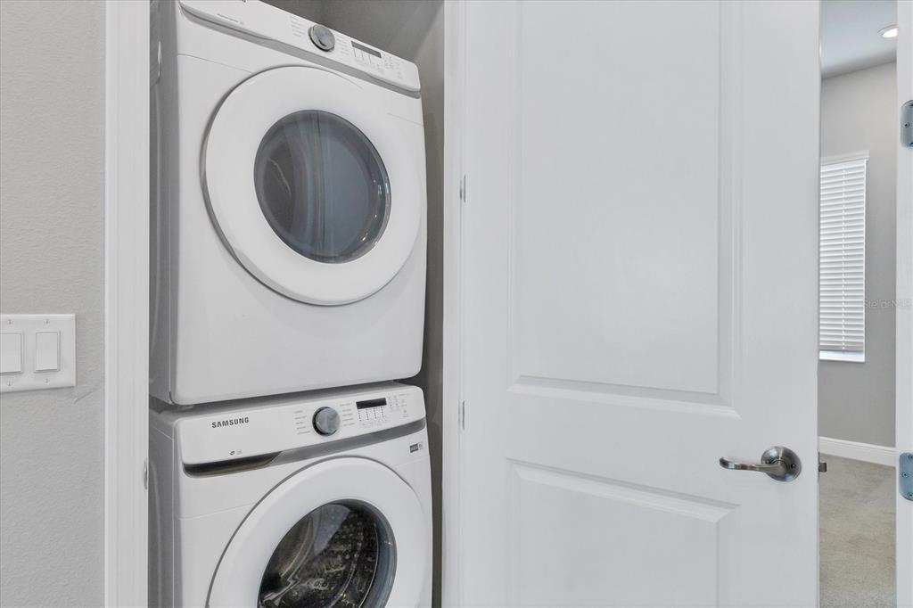2340 Lindstrom Street Sarasota, FL 34237 - Photo 35 of 59 a utility room with dryer and washer