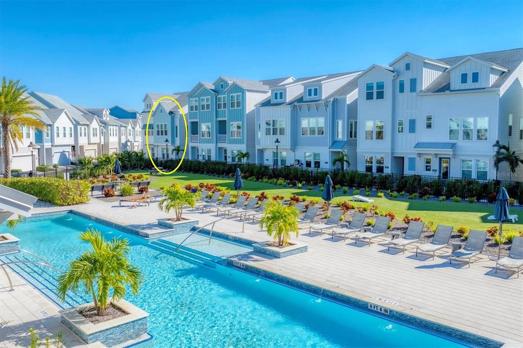 2340 Lindstrom Street Sarasota, FL 34237 - Photo 40 of 59 a view of a city with lawn chairs and swimming pool