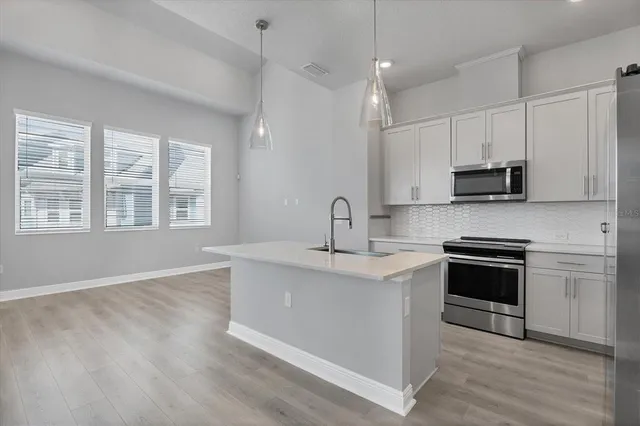 a bathroom with a double vanity sink mirror and double