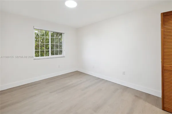 an empty room with a window