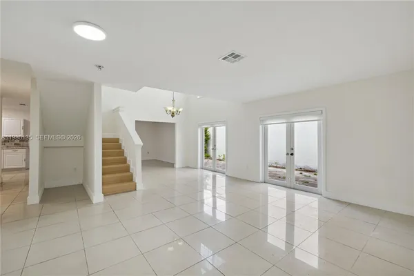 a view of entryway and hall with a window