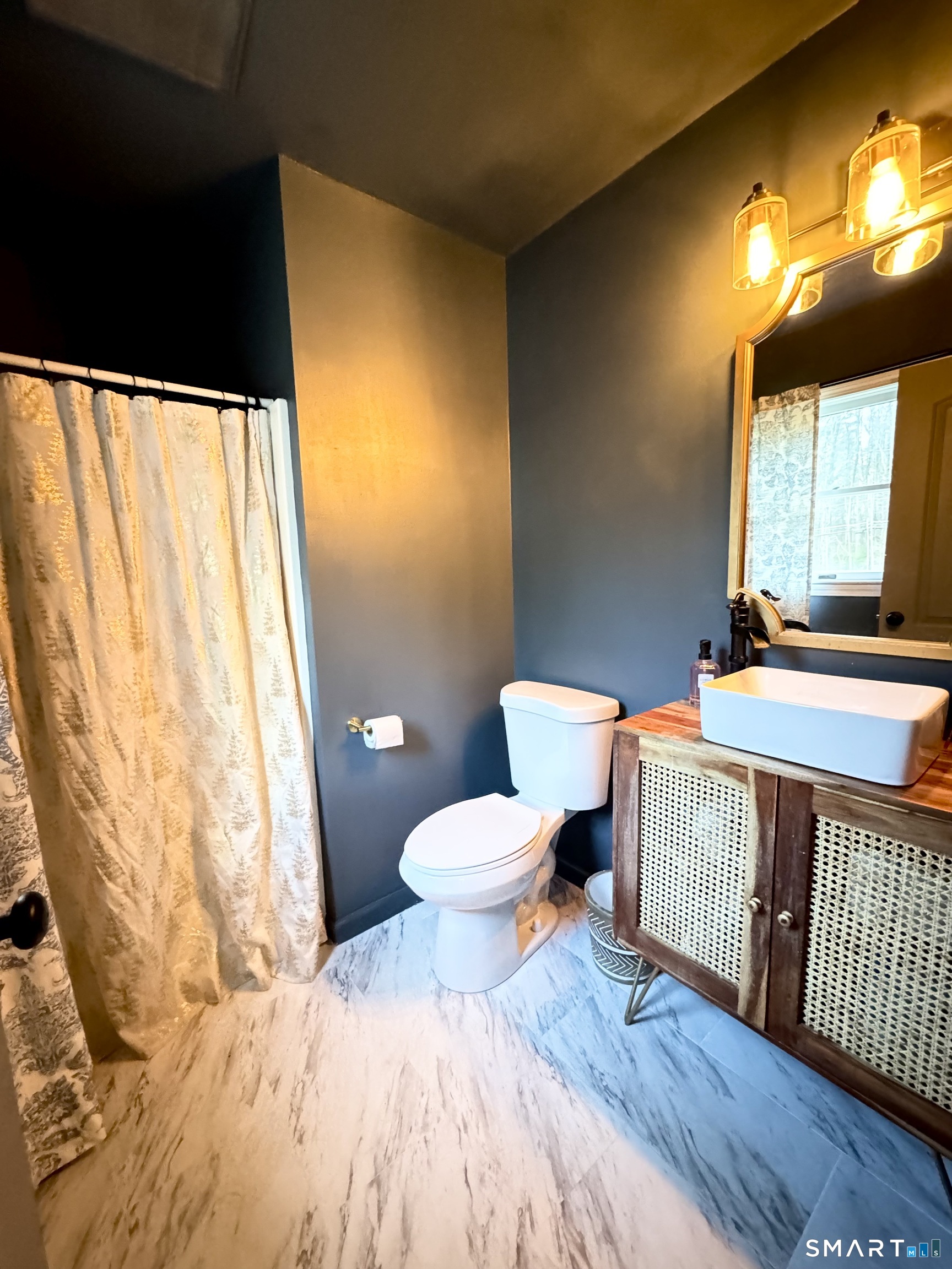 113 Michelec Road Stafford, CT 06076 - Photo 12 of 16 a bathroom with a sink and a toilet