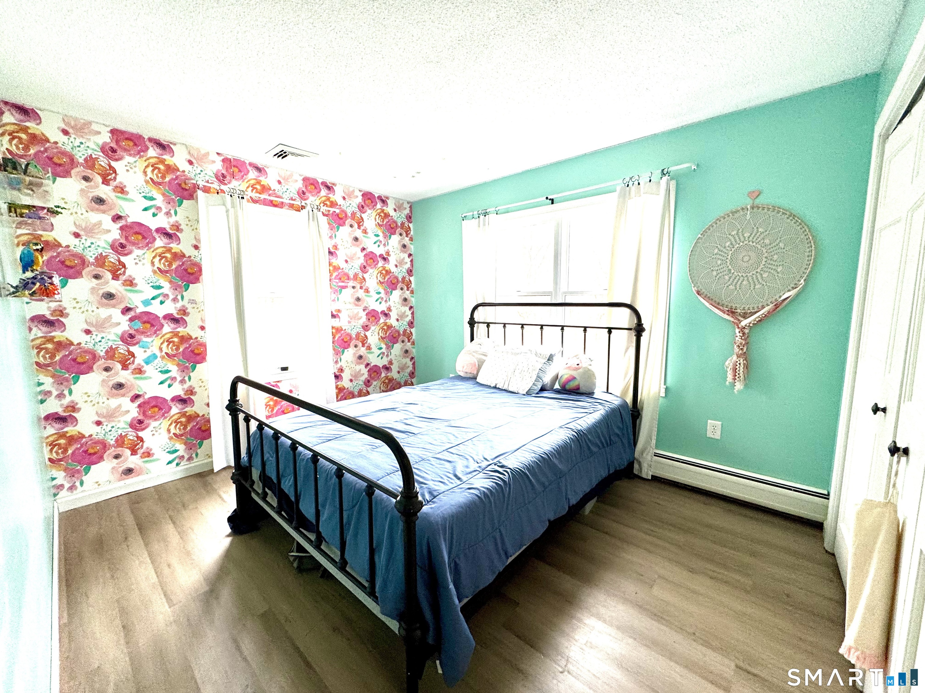 113 Michelec Road Stafford, CT 06076 - Photo 12 of 17 a bedroom with bed and a window