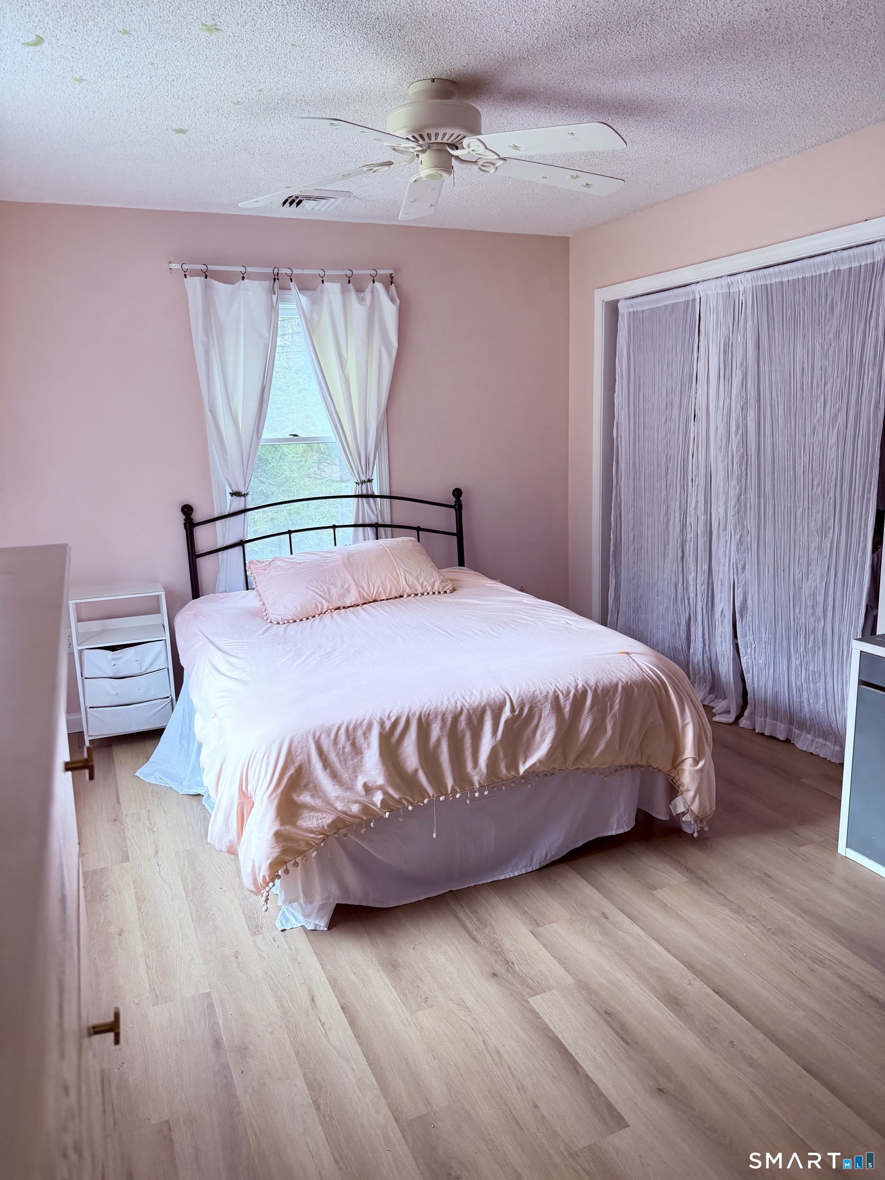 113 Michelec Road Stafford, CT 06076 - Photo 13 of 17 a bedroom with a bed and a window