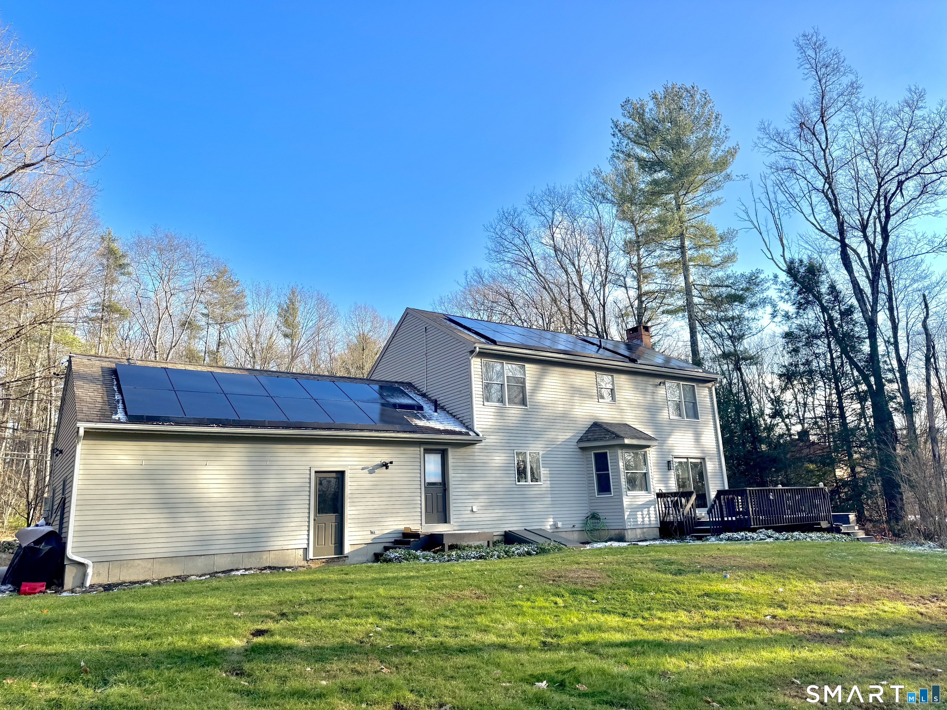 113 Michelec Road Stafford, CT 06076 - Photo 17 of 17 a view of a house with a yard porch and sitting area