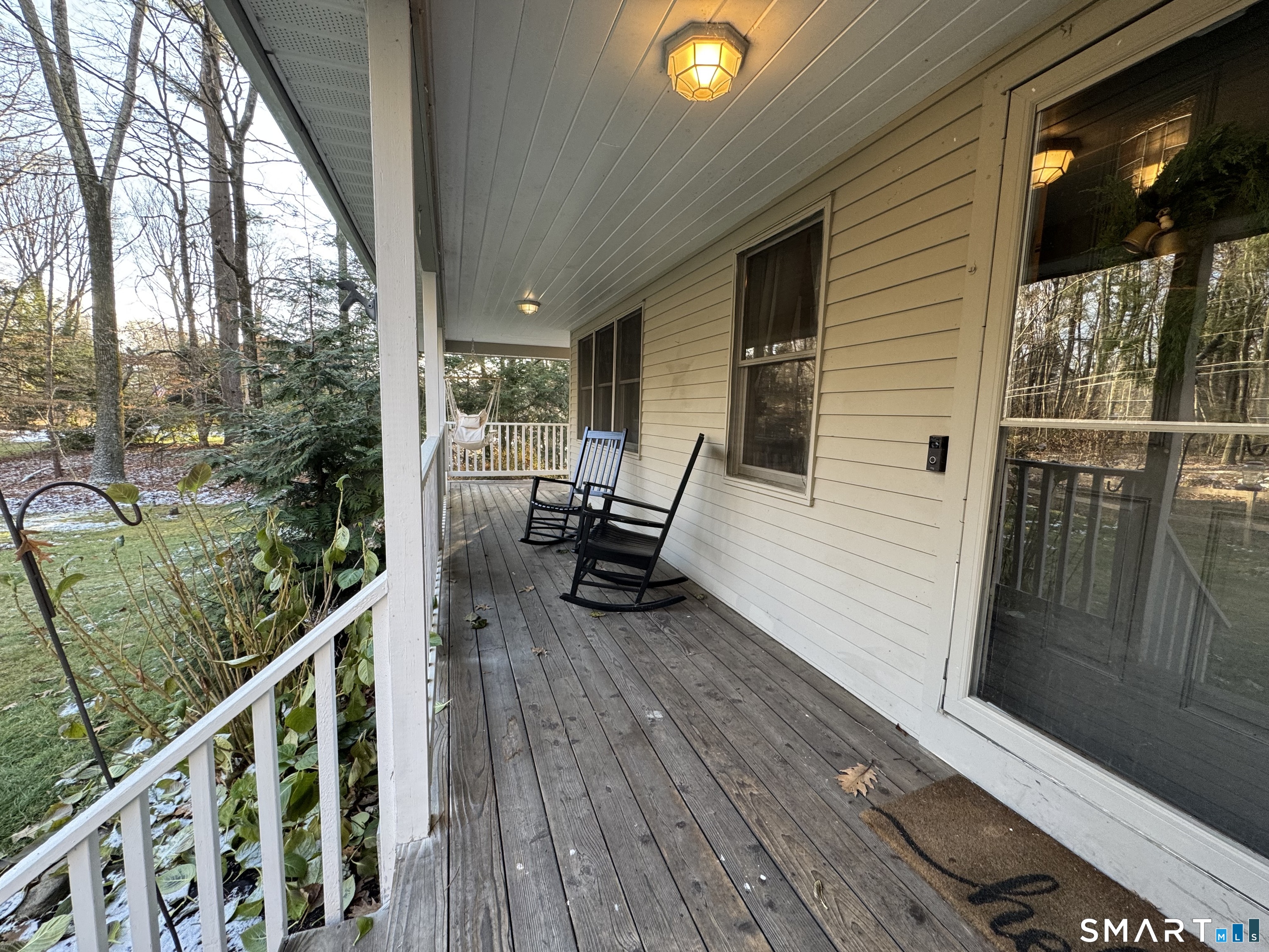 113 Michelec Road Stafford, CT 06076 - Photo 2 of 17 a view of a chair and tables in the balcony