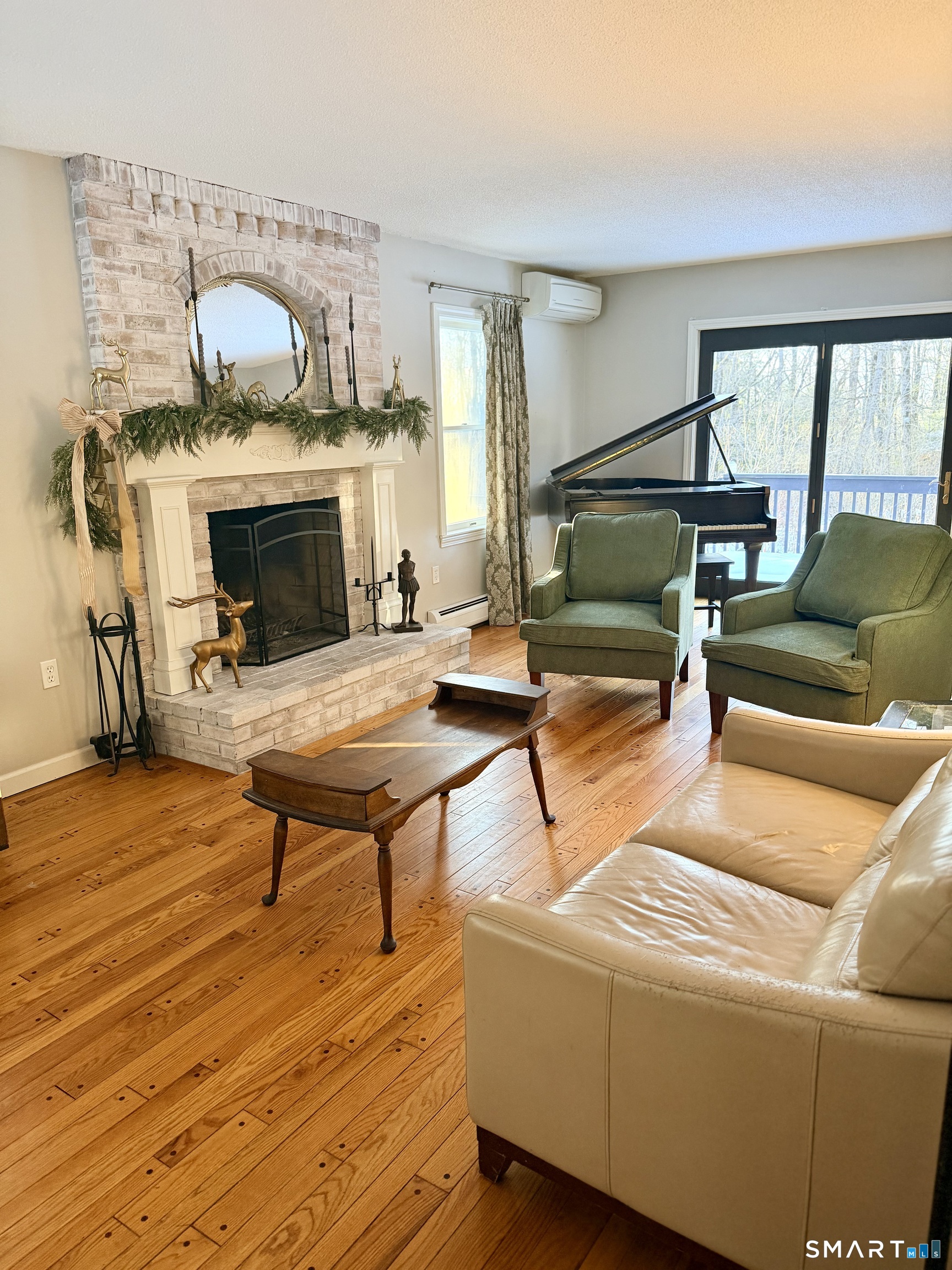 113 Michelec Road Stafford, CT 06076 - Photo 3 of 17 a living room with furniture and a fireplace