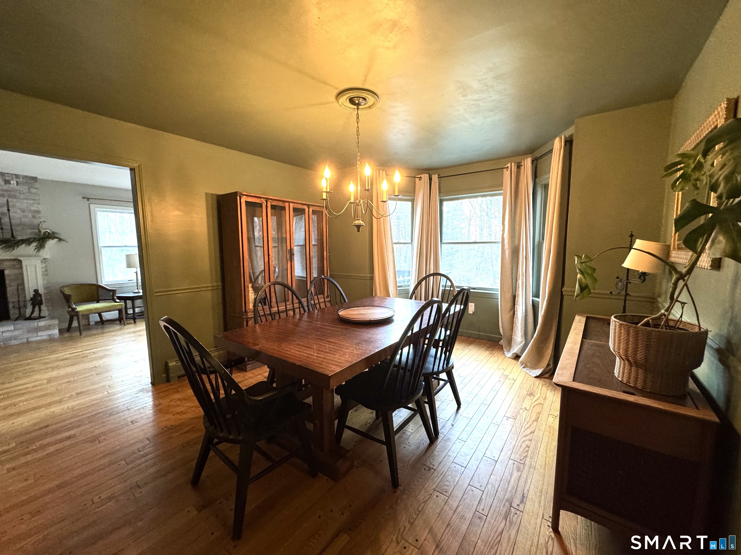 113 Michelec Road Stafford, CT 06076 - Photo 5 of 16 a view of a dining room with furniture window and wooden floor