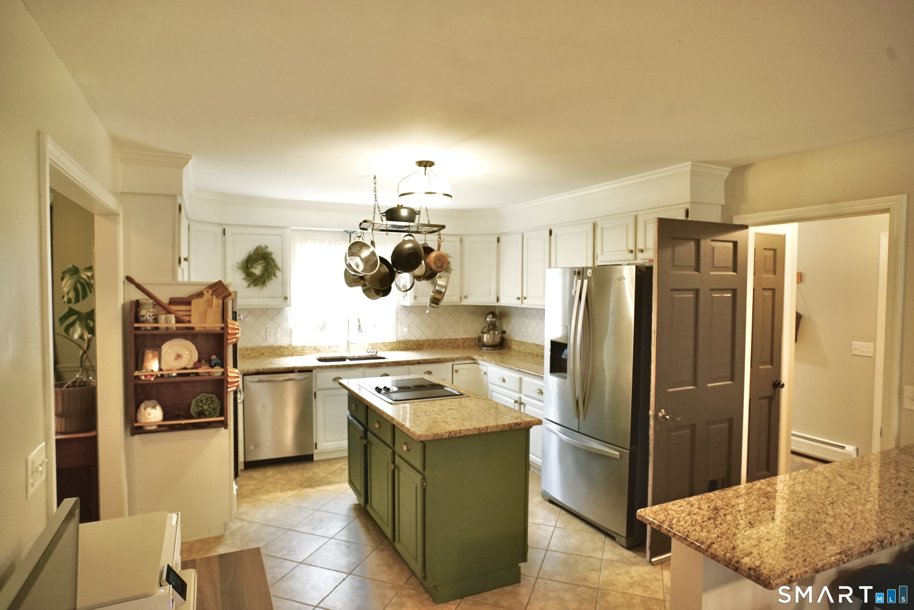113 Michelec Road Stafford, CT 06076 - Photo 6 of 16 a kitchen with stainless steel appliances granite countertop a refrigerator stove and sink