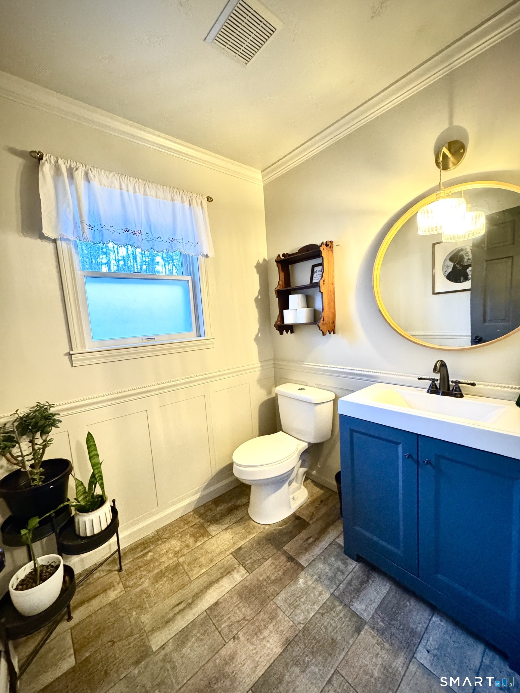 113 Michelec Road Stafford, CT 06076 - Photo 7 of 17 a bathroom with a toilet a sink and mirror