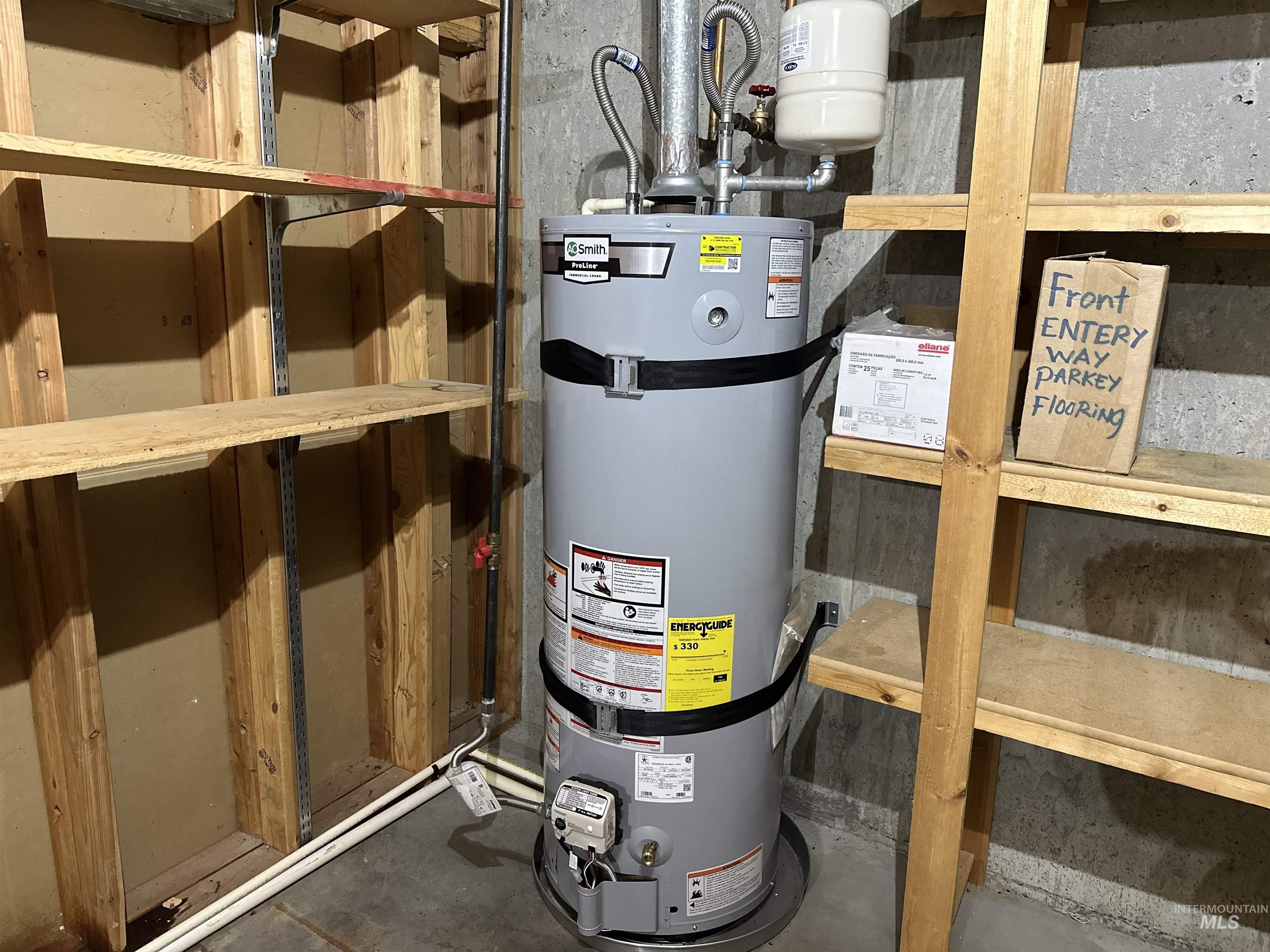 1620 6th Avenue Clarkston, WA 99403 - Photo 16 of 19 Water heater installation with an expansion tank, set on a concrete floor