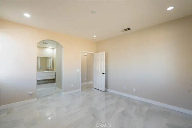 an empty room with a bathroom