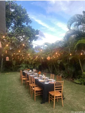 a view of a sitting area with furniture and garden