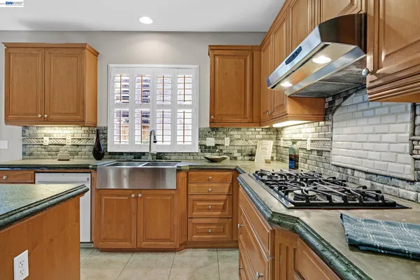 a view of a dining room with furniture and window