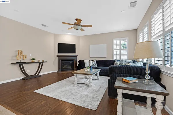 a living room with furniture and window