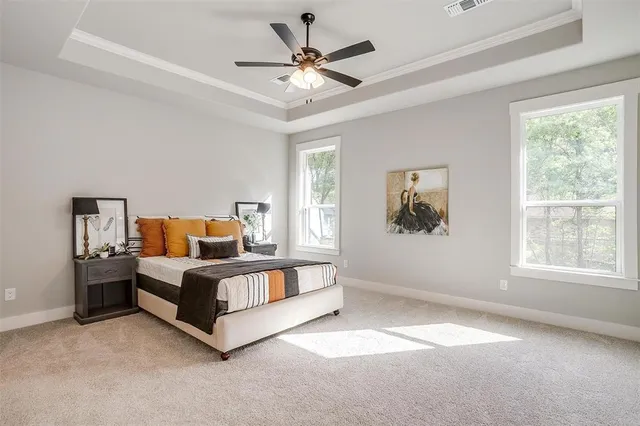 a bed room with a bed and a window