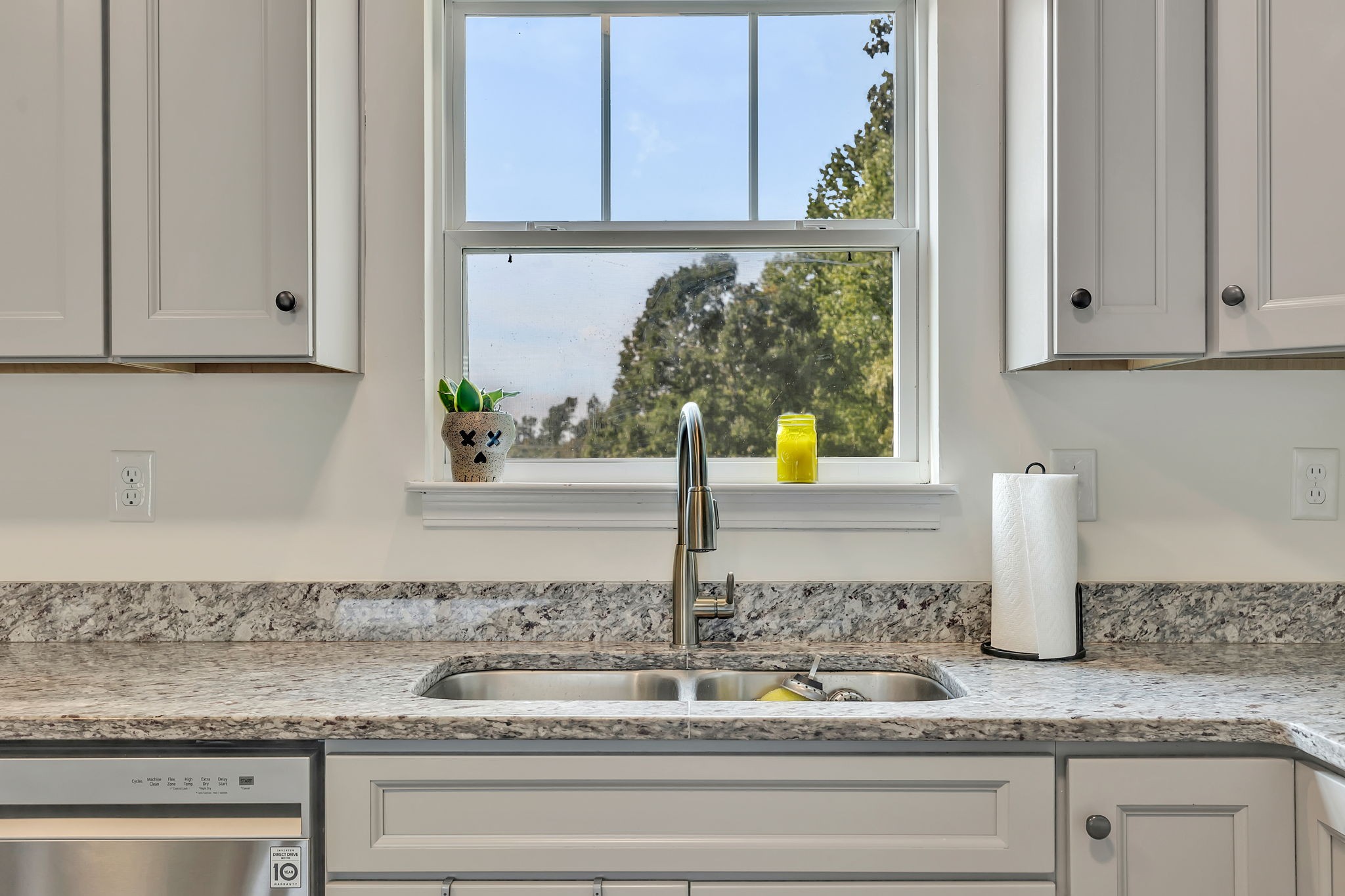 541 Murrell Road Dickson, TN 37055 - Photo 11 of 29 a kitchen with granite countertop a sink and a window