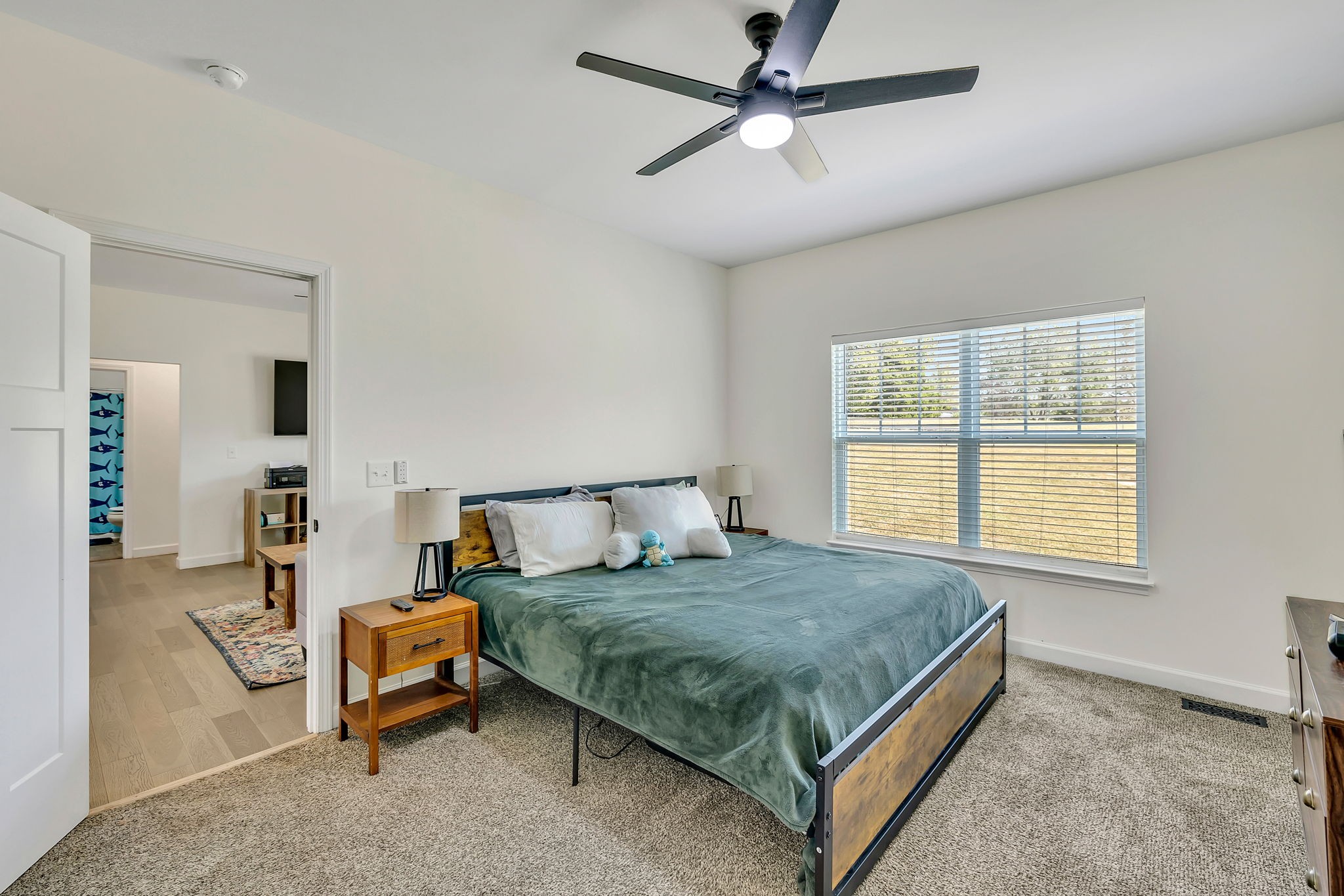 541 Murrell Road Dickson, TN 37055 - Photo 13 of 29 a bedroom with a bed a couch and a window