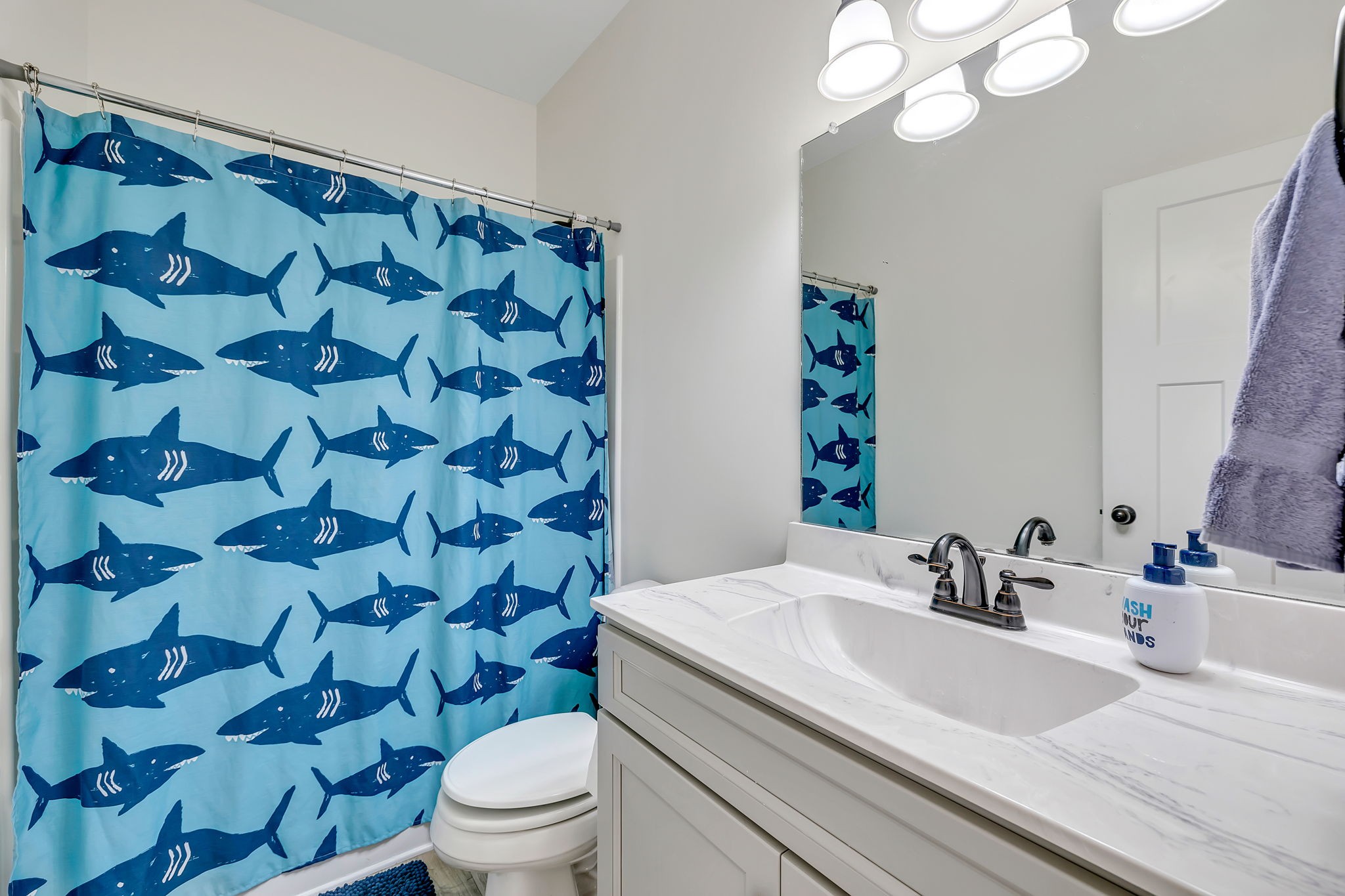 541 Murrell Road Dickson, TN 37055 - Photo 18 of 29 a bathroom with a sink toilet and shower