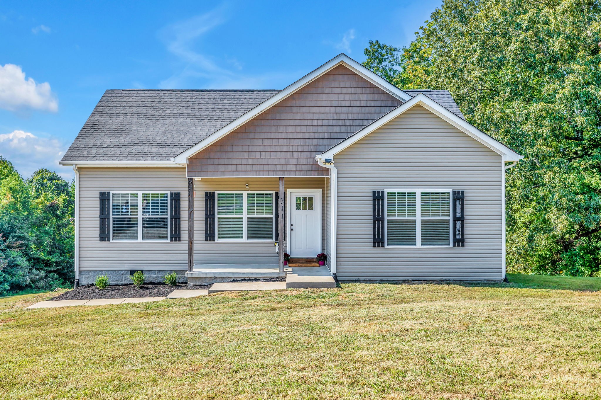 541 Murrell Road Dickson, TN 37055 - Photo 2 of 29 a view of a house with a yard