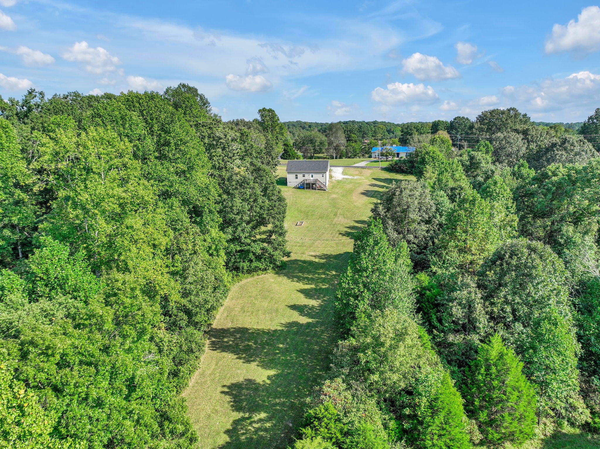 541 Murrell Road Dickson, TN 37055 - Photo 24 of 29 a aerial view of a houses with a yard and lake view