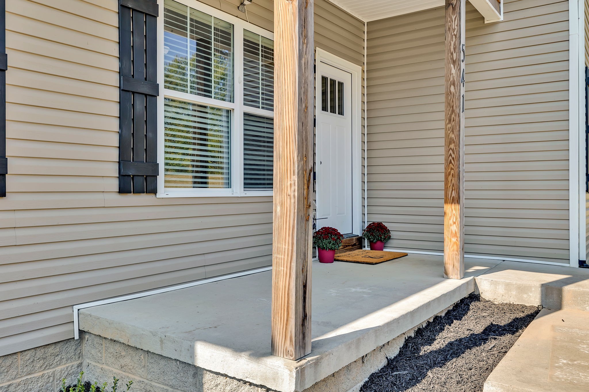 541 Murrell Road Dickson, TN 37055 - Photo 4 of 29 a view of a balcony with a potted plant