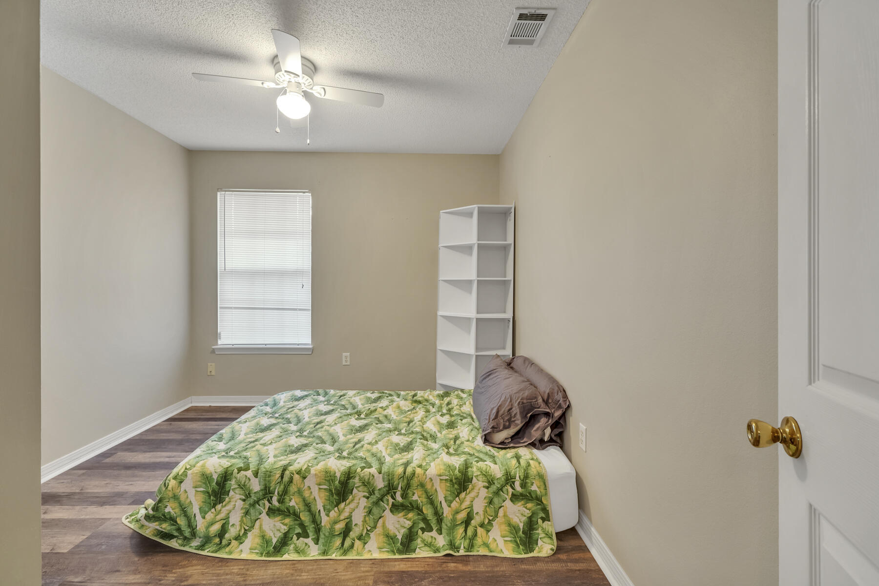 504 Easy Street Fort Walton Beach, FL 32547 - Photo 15 of 21 a bedroom with a bed and a window