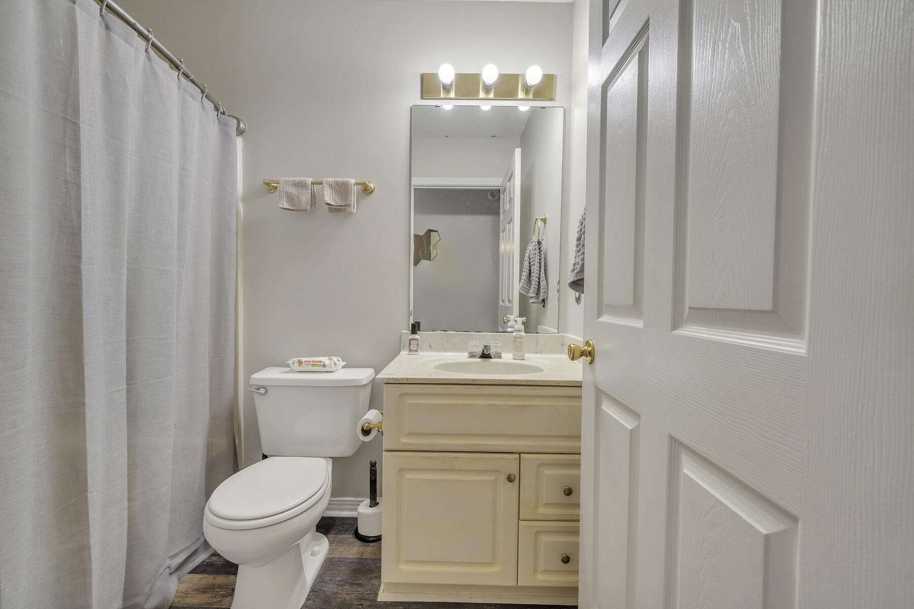 504 Easy Street Fort Walton Beach, FL 32547 - Photo 17 of 21 a bathroom with a sink a toilet and shower
