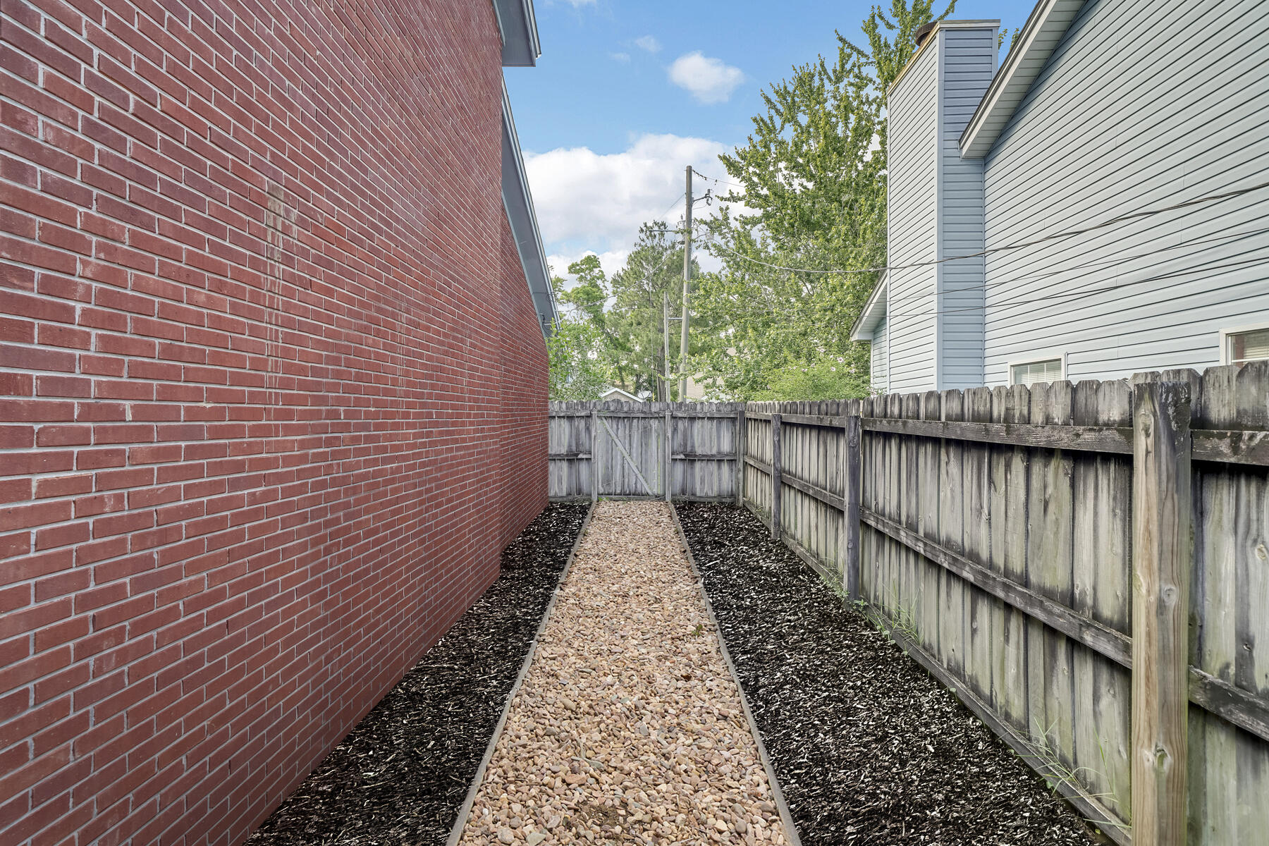 504 Easy Street Fort Walton Beach, FL 32547 - Photo 20 of 21 a view of a pathway with a balcony