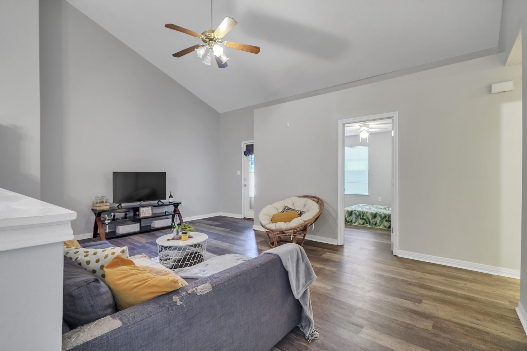 504 Easy Street Fort Walton Beach, FL 32547 - Photo 3 of 21 a living room with furniture and a flat screen tv