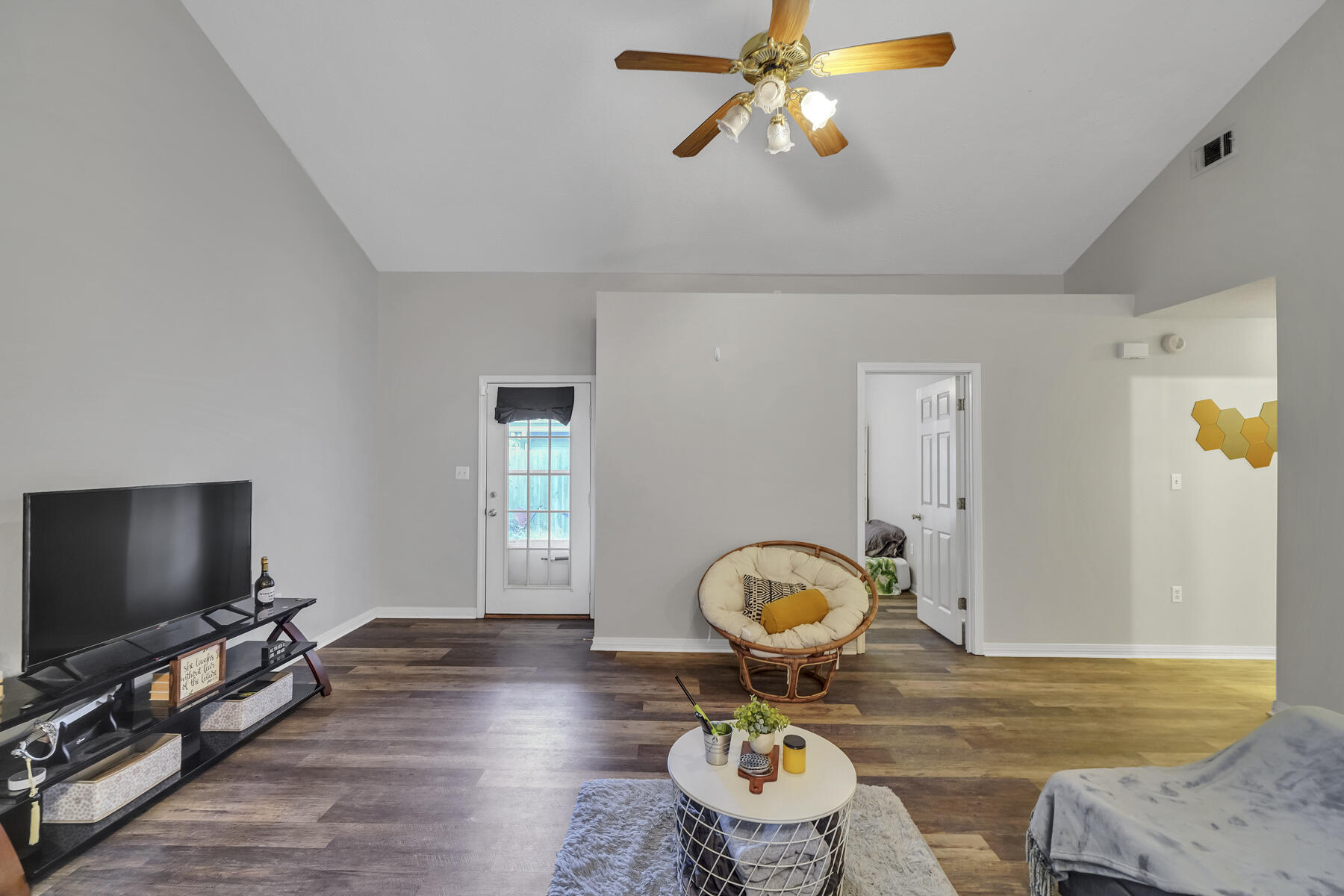 504 Easy Street Fort Walton Beach, FL 32547 - Photo 4 of 21 a living room with furniture and a flat screen tv