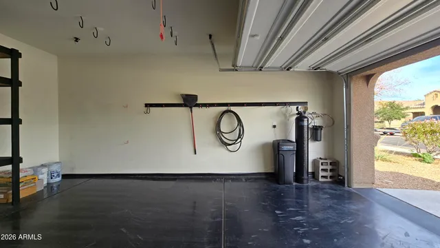 a view of room with wooden floor