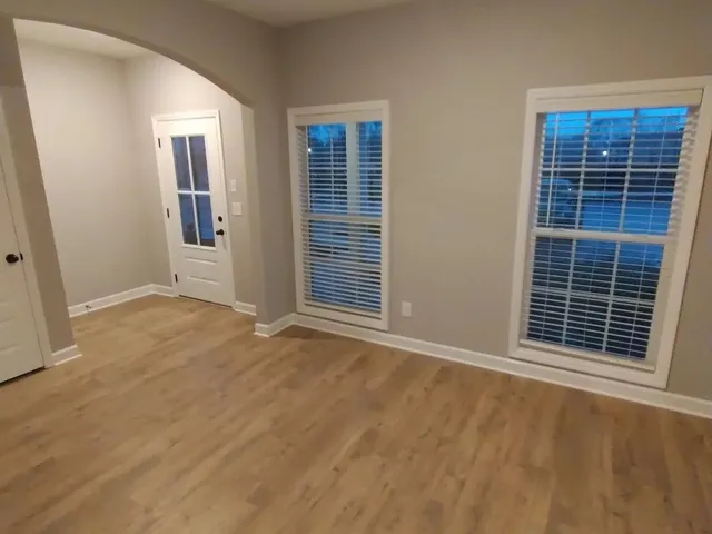 an empty room with windows