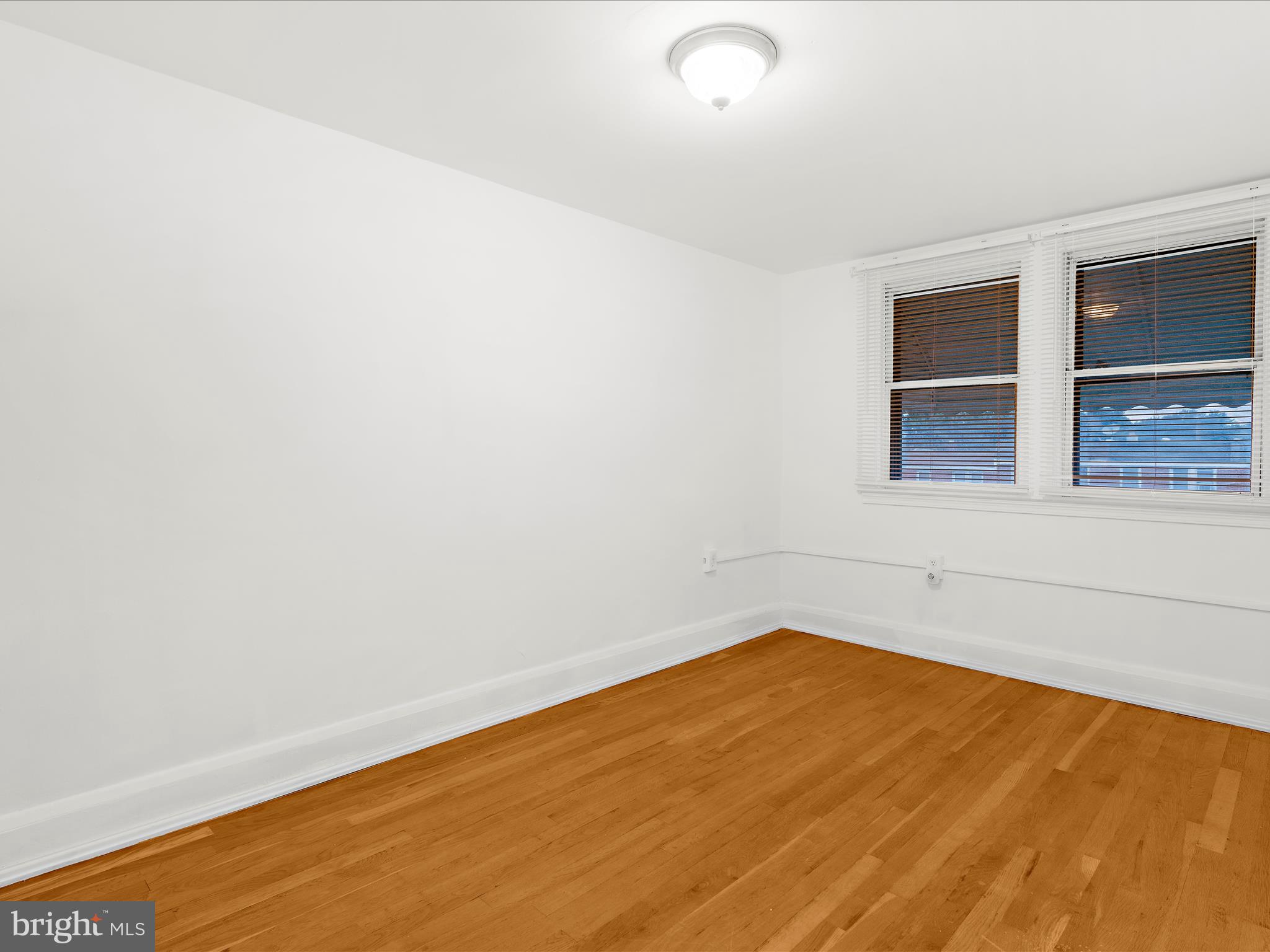 221 West Edgevale Road Baltimore, MD 21225 - Photo 20 of 37 an empty room with a empty space and window