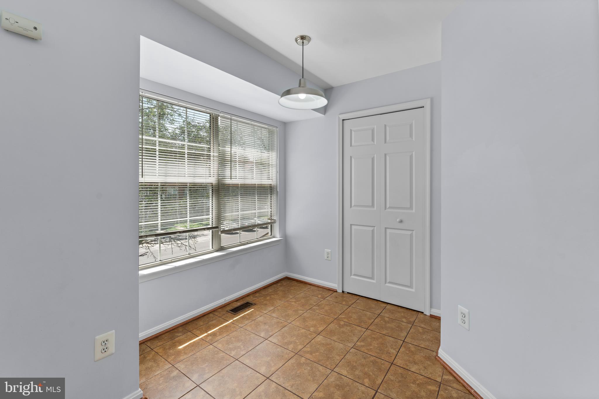 2204 Commissary Circle Odenton, MD 21113 - Photo 18 of 32 a view of an empty room with a window