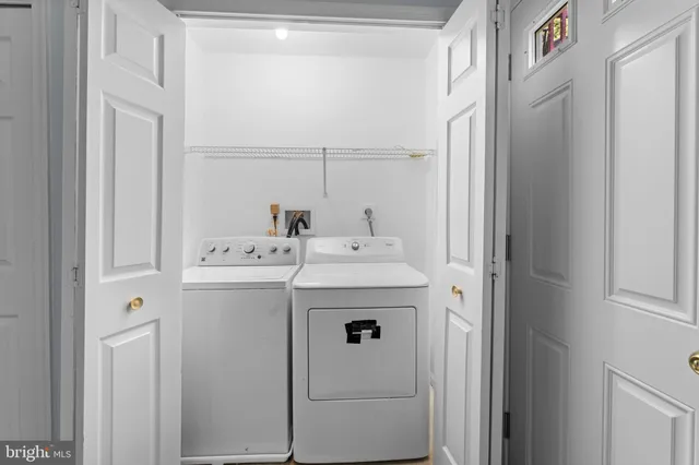 a utility room with dryer and washer